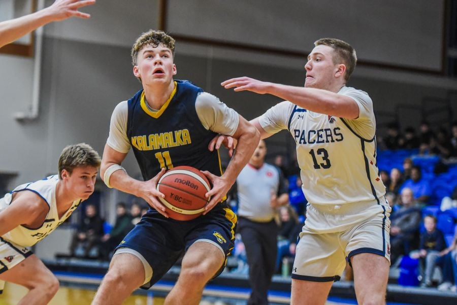 Okanagan schools impress on opening day of boys provincial basketball ...