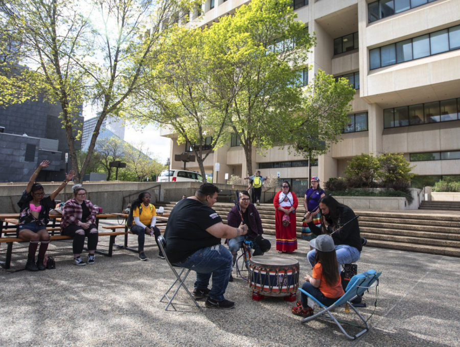 <who> Photo credit: Canadian Press </who> Supporters drum outside court after a jury finds two Alberta men guilty in the deaths of Métis hunters Jacob Sansom and his uncle Maurice Cardinal, in Edmonton.