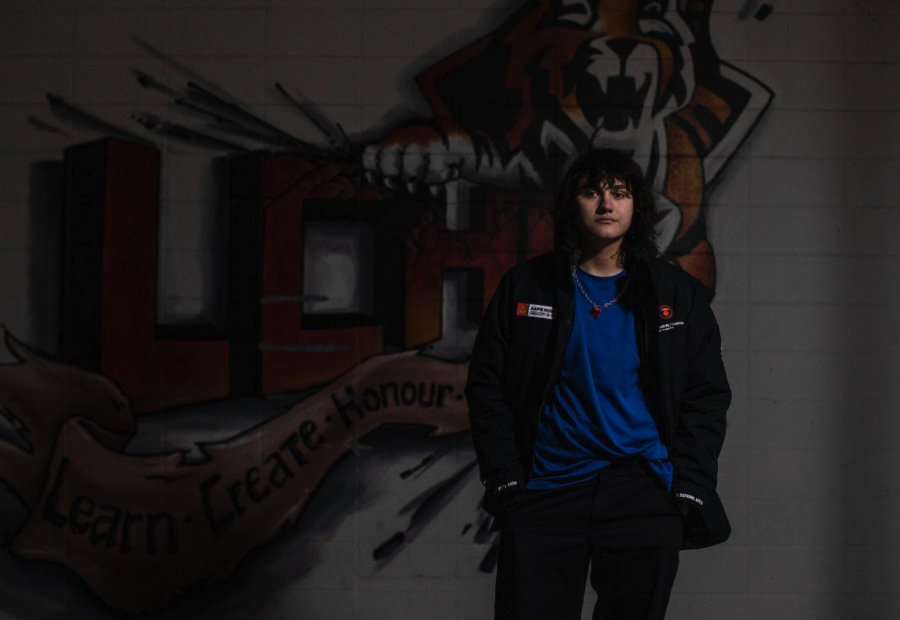 <who> Photo credit: Canadian Press </who> High schooler Aspen Cervo says he began thinking about a student walkout over the Alberta government's planned policies around transgender youth right after Premier Danielle Smith announced them last week.