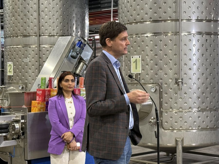 </who>However, Eby had no definitive answers. In the background is Vernon-Lumby NDP MLA Harwinder Sandhu.