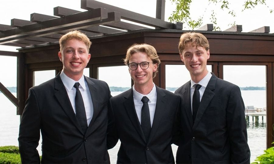 <who>Photo Credit: UBCO</who>(L to R) Micah, Jackson and Aiden Borne pose in this family photo. Aiden is graduating this year from UBC Okanagan’s nursing program.