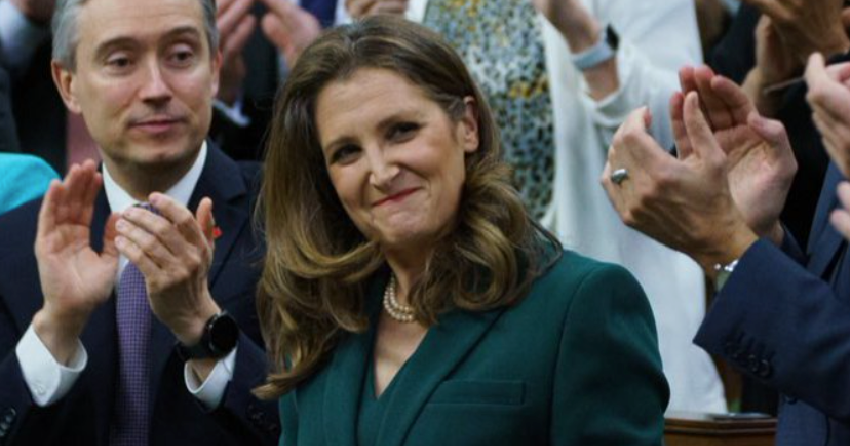 <who> Photo credit: Government of Canada </who> Finance Minister Chrystia Freeland being applauded by her fellow Liberals after announcing the new budget.