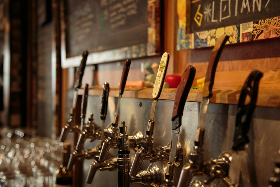 <who>Photo Credit: BC Ale Trail</who>The taps at Jackknife Brewing.