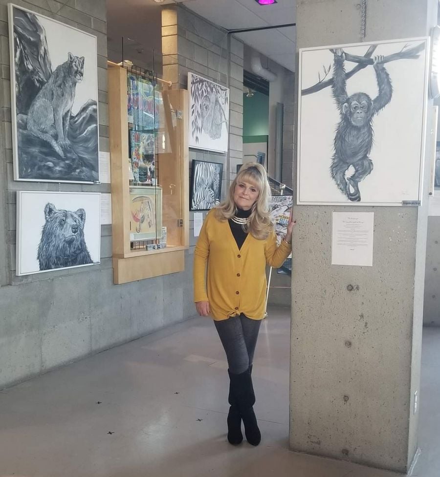 <who>Photo Credit: Contributed</who>Tracy Thring poses with her work at the Rotary Centre for the Arts on a previous occasion.